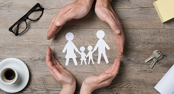 hands circling cartoon image of a family